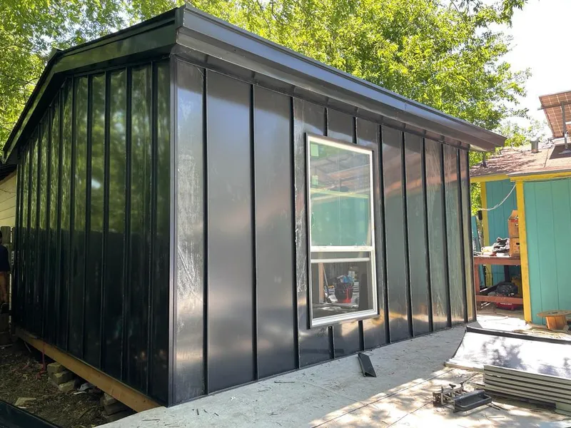 Black standing seam metal wall panels for Metal Roof Installation in Pike Creek Valley