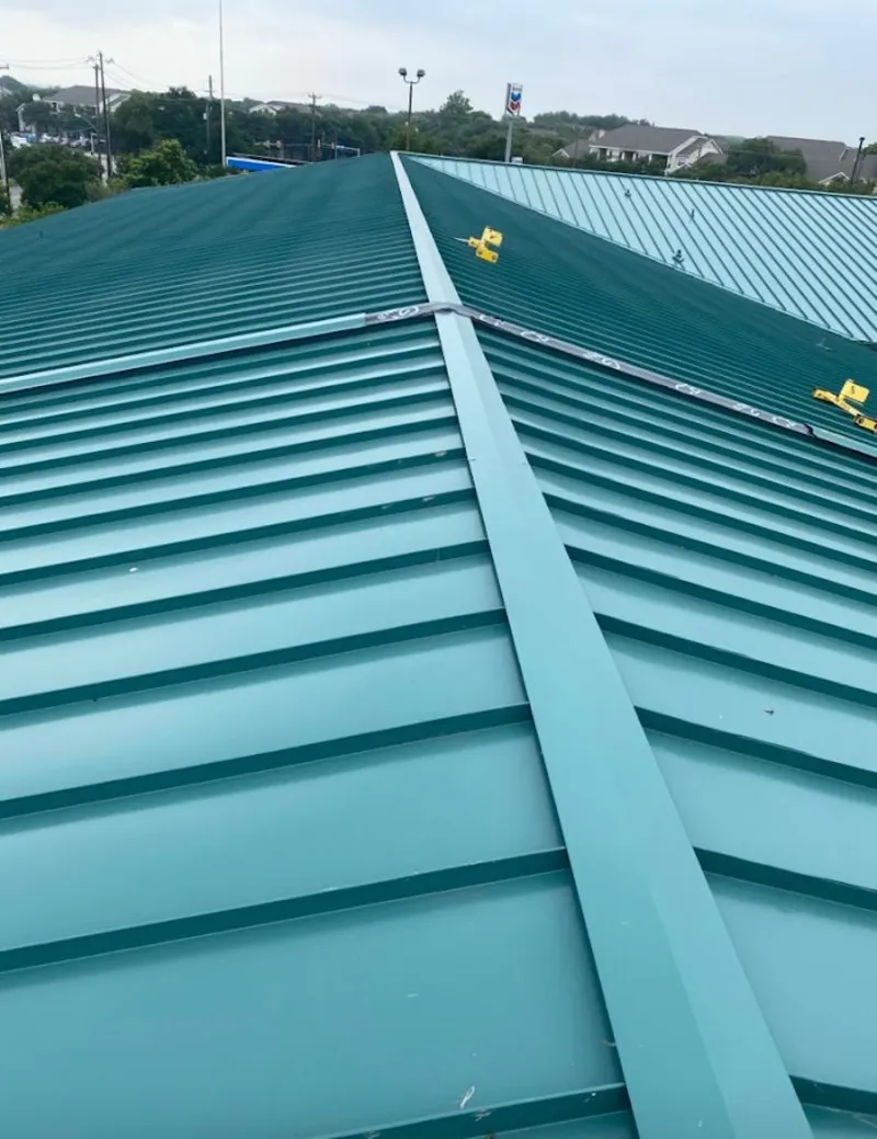 Green commercial metal roof ridge and valley for Metal Roof Repair in Pike Creek Valley